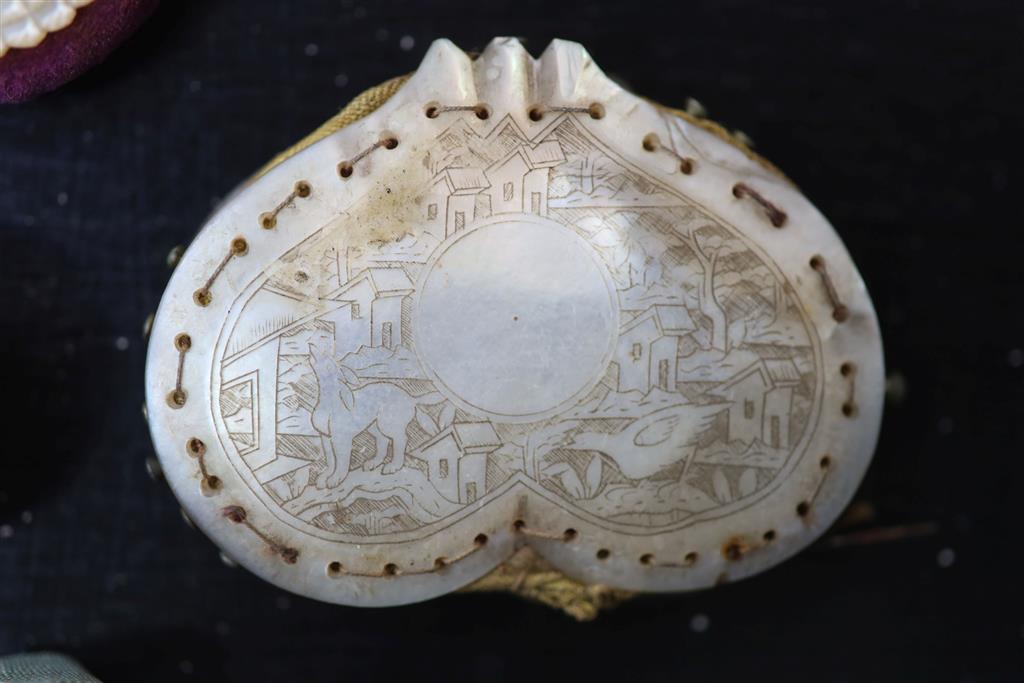 Eight assorted 19th century mother of pearl mounted pin cushions